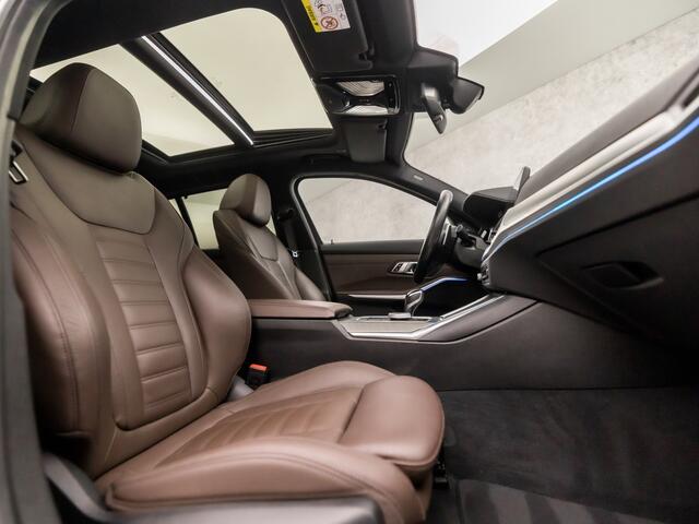 BMW 3-SERIE Touring 330e xDrive M Sport 293Pk Automaat (PANORAMADAK, M PAKKET, LASER KOPLAMPEN, MEMORY SEATS, HEAD-UP DISPLAY, HARMAN/KARDON, 360 CAMERA, ADAPTIVE CRUISE, APPLE CARPLAY, NIEUWE APK, NIEUWSTAAT)