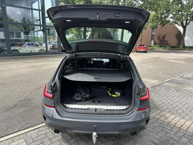 BMW 3-SERIE Touring 330e xDrive PANO | ADD. CRUISE | CAMERA | ELEKTRISCHE TREKHAAK | RIJKLAAR GELEVERD MET 12 MND BOVAG GARANTIE