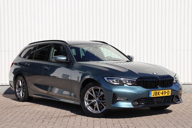 BMW 3-SERIE Touring 320i High Executive | Adap. Cruise | Stoelverwarming | Halfleder | Camera | Navigatie | Carplay