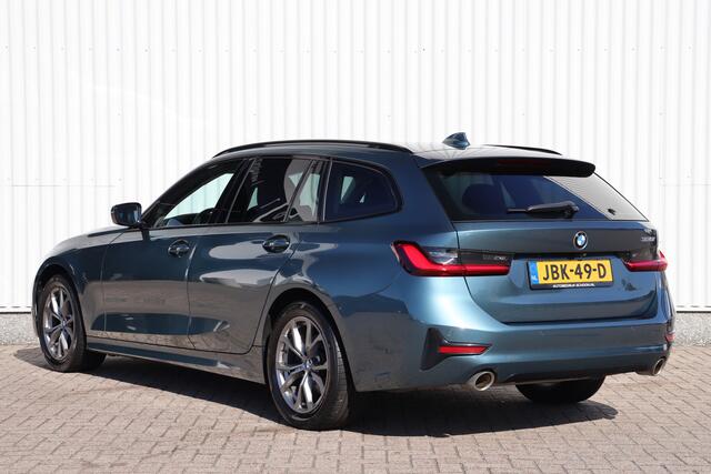 BMW 3-SERIE Touring 320i High Executive | Adap. Cruise | Stoelverwarming | Halfleder | Camera | Navigatie | Carplay