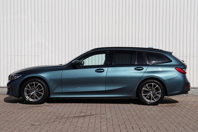 BMW 3-SERIE Touring 320i High Executive | Adap. Cruise | Stoelverwarming | Halfleder | Camera | Navigatie | Carplay