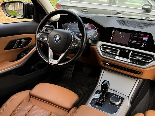 BMW 3-SERIE 320e BUSINESS+ EDITION LEDER/CAMERA/TREKHAAK