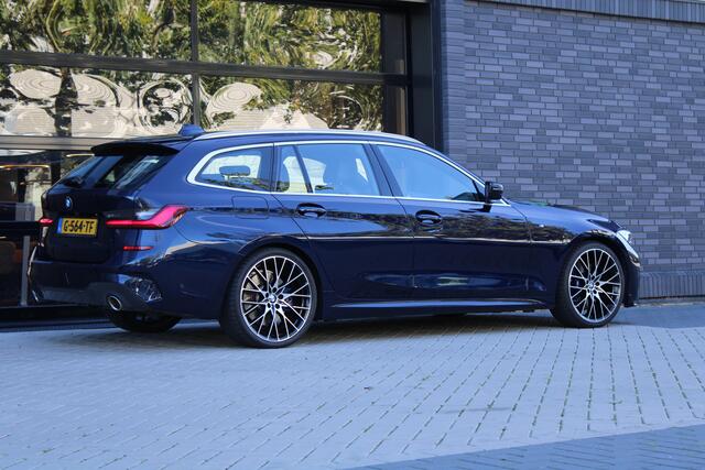 BMW 3-SERIE Touring 320i High Executive Edition | NAP | M-SPORT | HUD | LEDER | CAMERA | TREKHAAK | LED | TANZANITE BLUE |
