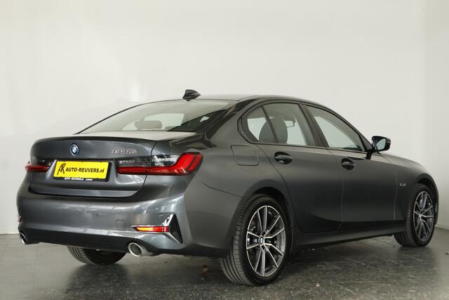 BMW 3-SERIE 320e High Executive / LED / Navi / CarPlay / Leder / DAB