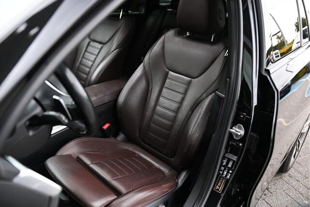 BMW 3-SERIE Touring M340i xDrive Automaat / Panoramadak / Trekhaak / Sportstoelen / Laserlight / M Adaptief onderstel / Comfort Access / Gesture Control / Stoelverwarming / Head-Up