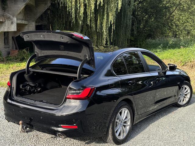 BMW 3-SERIE 320e BUSINESS+ EDITION LEDER/CAMERA/TREKHAAK