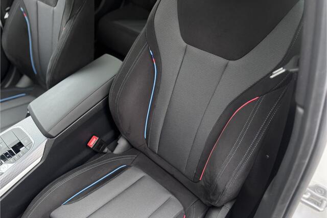 BMW 3-SERIE Touring 330e M-Sport | 19,5 kWh Accu | Panodak | Head-Up | Memory | Trekhaak | 360° Camera | Fabrieksgarantie