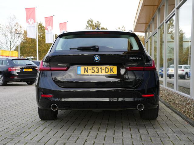 BMW 3-SERIE Touring 320e Business Edition Plus | Navigatie | SOH 91% | Laserlicht | Keyless