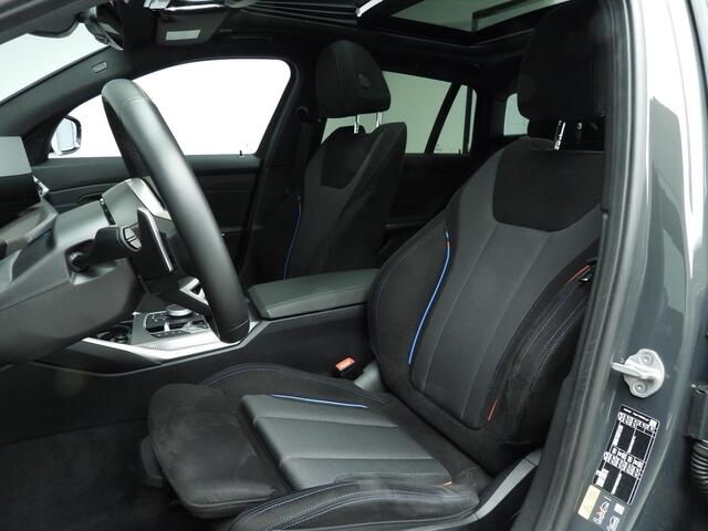 BMW 3-SERIE Touring 330e | M-Sportpakket | LED | HUD | Schuifdak | Active Cruise | Trekhaak | DAB | Hifi speakers | Alu 18 inch