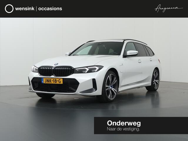 BMW 3-SERIE Touring 330e | M-Pakket | Panoramadak | Ele. stoelen + Geheugen | HUD | Sportstoelen | Camera | Apple CarPlay/Android auto | Adaptieve Cruise Control | Comfort Pakket | M-Sport Pro | HiFi | Curved Display |