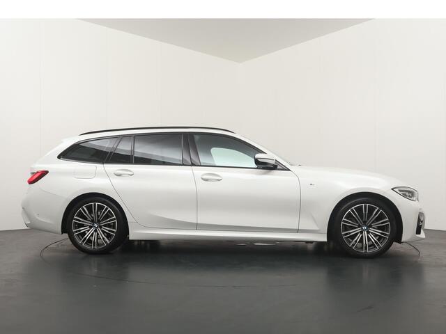 BMW 3-SERIE Touring 320i High Executive Edition | Stoelverwarming | Achteruitrijcamera | Trekhaak |