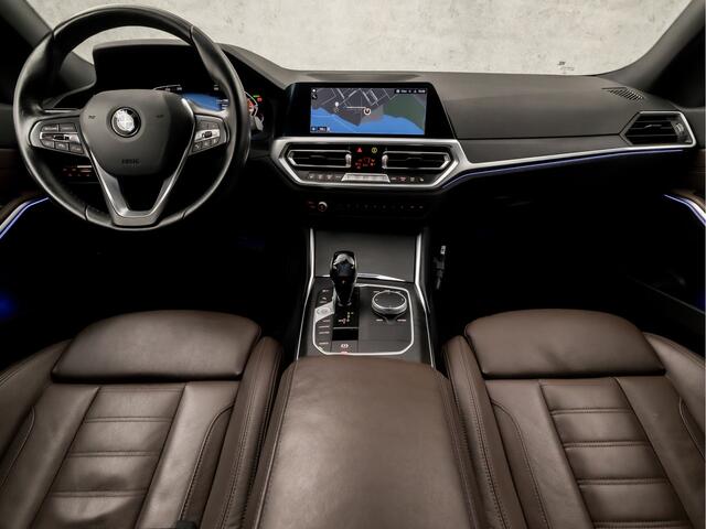 BMW 3-SERIE Touring 318i Sportline 157Pk Automaat (APPLE CARPLAY, GROOT NAVI, ZWART HEMEL, LEDER, STOELVERWARMING, SPORTSTOELEN, CAMERA, ELEK ACHTERKLEP, GETINT GLAS, TREKHAAK, NIEUWSTAAT)