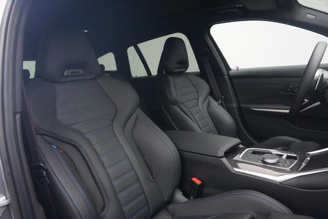 BMW 3-SERIE Touring 330e M Sportpakket Pro 19'' / Panoramadak / Harman Kardon / Driving Assistant Professional / Elektrisch verstelbare stoelen / Trekhaak