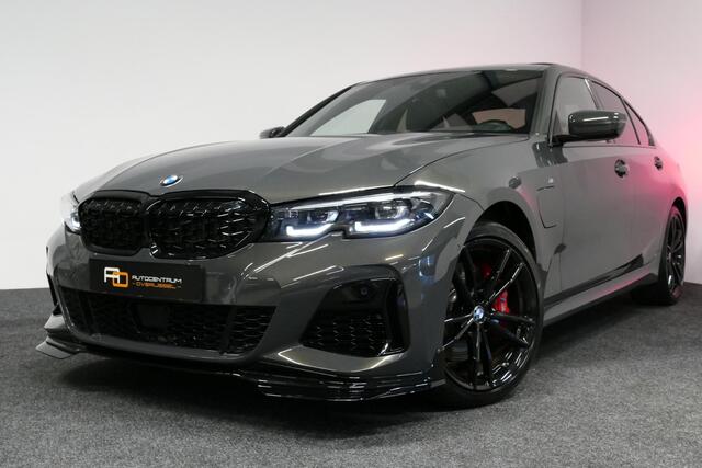 BMW 3-SERIE 330e xDrive M Sport / M340i Diffuser / Black Diamond M Grill / M340i M Sport bumper pakket / Schuif-/kanteldak / Premium kleur Dravitgrau / Apple Carplay - Android Auto / Stoelverwarming / Ambienteverlichting / 19'' LMV / Stuurwiel verwarming / Full LED /