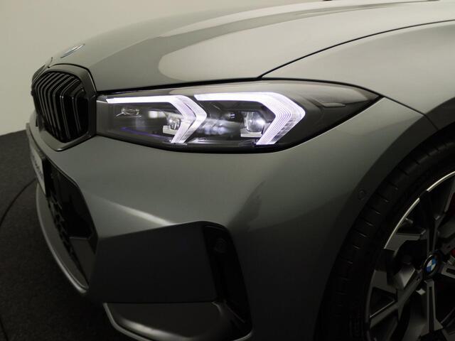 BMW 3-SERIE Touring 330e M Sportpakket Pro | Innovation Pack | Comfort Pack | Trekhaak | Panoramadak | Elektrisch Verstelbare Stoelen | Driving Assistant Professional | Harman Kardon | 19''