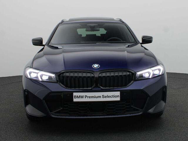 BMW 3-SERIE Touring 320e M Sportpakket Pro | Travel Pack | Innovation Pack | Comfort Pack | Entertainment Pack | Trekhaak | Comfort Access | Elektrisch Verstelbare Stoelen | Driving Assistant Professional | Harman Kardon | 19''