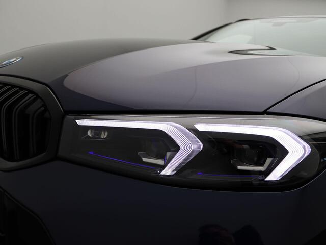 BMW 3-SERIE Touring 320e M Sportpakket Pro | Travel Pack | Innovation Pack | Comfort Pack | Entertainment Pack | Trekhaak | Comfort Access | Elektrisch Verstelbare Stoelen | Driving Assistant Professional | Harman Kardon | 19''