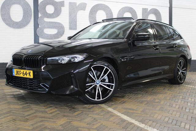 BMW 3-SERIE Touring 330e xDrive | M- Sport | Incl. 12 maanden garantie | 292 PK | Panorama dak | 360° camera | Head-up display | Memory sportstoelen | Shadow-line | Dodehoek detectie | Widescreen Display | Apple CarPlay | 19'' Breedset | Stoelverwarming |