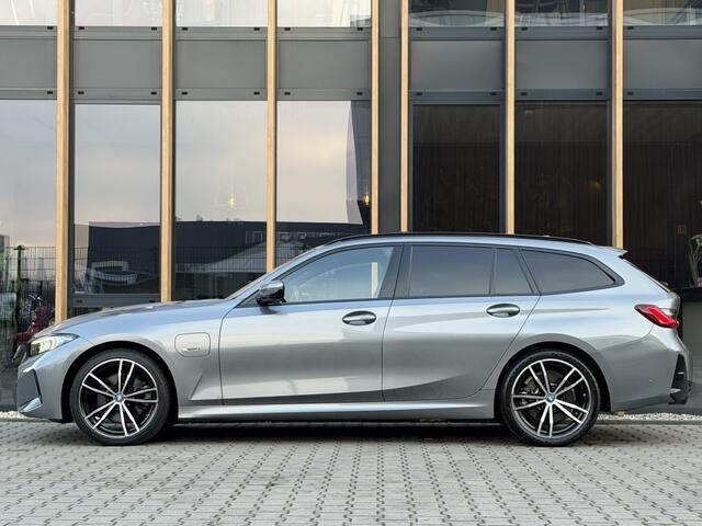 BMW 3-SERIE Touring 330e M-sport | Panorama-dak | Sfeerverlichting | Head-up | Memor