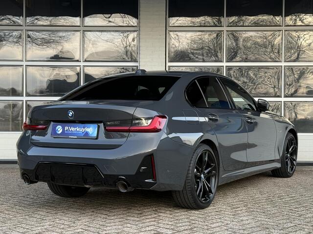 BMW 3-SERIE 320e M SPORT | 19 INCH VELGEN | PANORAMA | M SPORT REMMEN | TREKHAAK | ELEKTR. STOELEN MEMORY |
