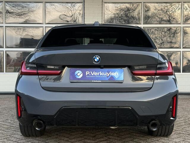 BMW 3-SERIE 320e M SPORT | 19 INCH VELGEN | PANORAMA | M SPORT REMMEN | TREKHAAK | ELEKTR. STOELEN MEMORY |