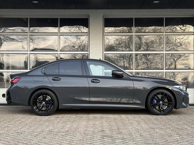 BMW 3-SERIE 320e M SPORT | 19 INCH VELGEN | PANORAMA | M SPORT REMMEN | TREKHAAK | ELEKTR. STOELEN MEMORY |