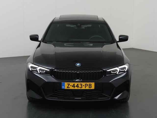BMW 3-SERIE 320e | M-Pakket | Panoramadak | Keyless go | Digitaal Dashboard | Apple Carplay/Android Auto | DAB | Cruise control adaptief |