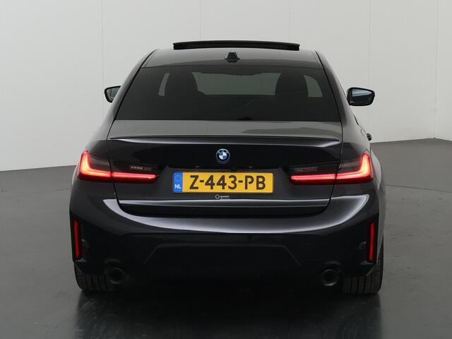BMW 3-SERIE 320e | M-Pakket | Panoramadak | Keyless go | Digitaal Dashboard | Apple Carplay/Android Auto | DAB | Cruise control adaptief |