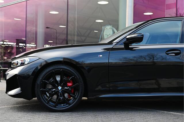 BMW 3-SERIE 318i M Sport Automaat / Trekhaak / Sportstoelen / Achteruitrijcamera / M Sportonderstel / Comfort Access / Stuurverwarming / Adaptieve LED / Harman Kardon / Widescreen Display