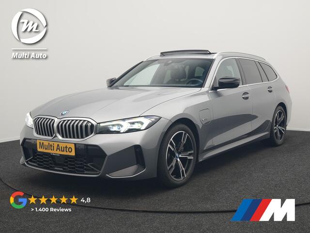 BMW 3-SERIE Touring 320e M Sport FACELIFT MODEL Plug In Hybrid Dealer O.H PHEV | Panodak | Trekhaak af Fabriek | Adaptive Cruise | Alcantara Sportstoelen Memory | Widescreen Navi | Keyless | Sfeerverlichting | Apple Carplay | 18"L.M |