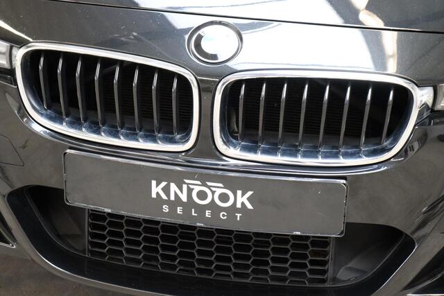 BMW 3-SERIE Touring 320i High Executive M Sport Pakket Automaat / Navigatiesysteem Professional / Trekhaak / Leder / Parkeersensoren / LED-koplampen / Stoelverwarming / Hifi / 18 Inch / Extra Getint Glas / Climate Control / Shadow Line