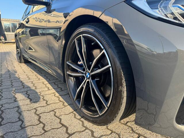 BMW 3-SERIE 330i High Executive panorama, leer, hud, navi, cruise