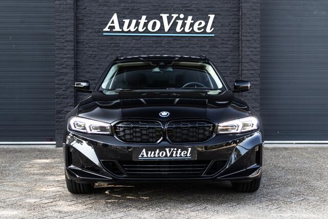 BMW 3-SERIE Touring 330e | Head-Up | Trekhaak | Sportleder | Camera | Comfort Access | Memory