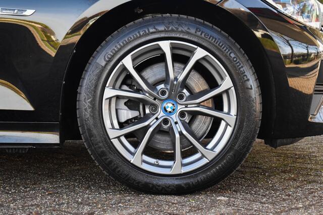 BMW 3-SERIE Touring 320e Panoramadak ACC Trekhaak Stuur/Stoelverwarmin