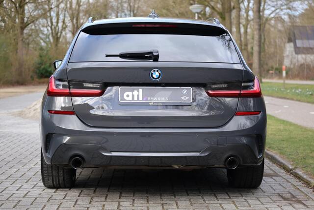 BMW 3-SERIE Touring 330e High Executive M-Sport | Pano | HUD | Laser | Adap Cruise | Elektr. trekhaak | Adap onderstel | Elektr. stoel memory | Hifi | Camera | Keyless | Grootlichtassistent | Etc.