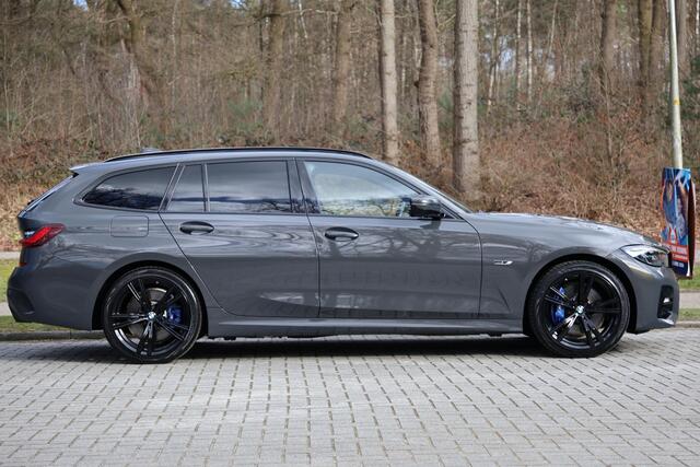 BMW 3-SERIE Touring 330e High Executive M-Sport | Pano | HUD | Laser | Adap Cruise | Elektr. trekhaak | Adap onderstel | Elektr. stoel memory | Hifi | Camera | Keyless | Grootlichtassistent | Etc.