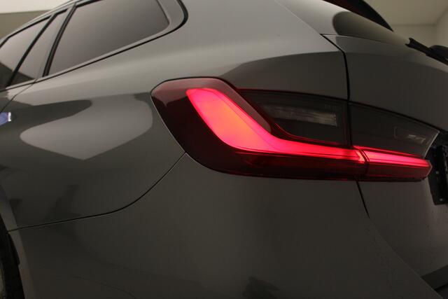 BMW 3-SERIE Touring 318d M-Sport Pro | Harman Kardon | Active Cruise Controle | Stoelverwarming | Zomer en Winterset