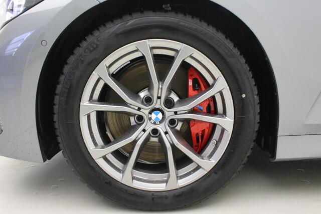 BMW 3-SERIE Touring 318d M-Sport Pro | Harman Kardon | Active Cruise Controle | Stoelverwarming | Zomer en Winterset