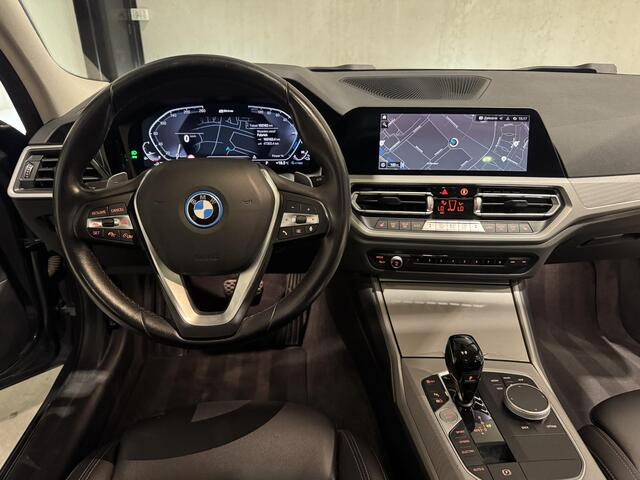 BMW 3-SERIE Touring 320e xDrive Business | panorama | navi | led | trekhaak |