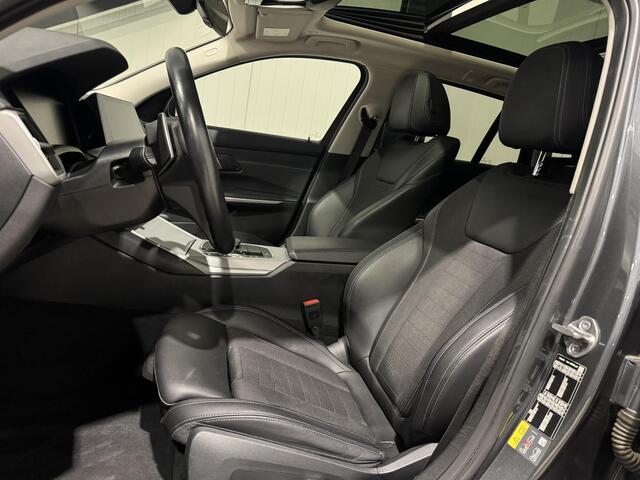 BMW 3-SERIE Touring 320e xDrive Business | panorama | navi | led | trekhaak |