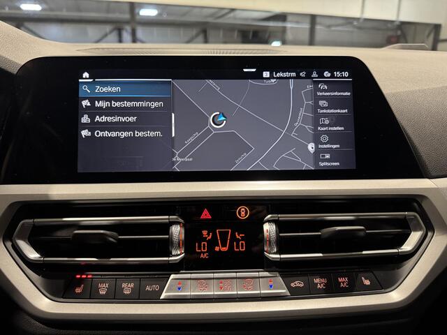 BMW 3-SERIE Touring 320e xDrive Business | panorama | navi | led | trekhaak |