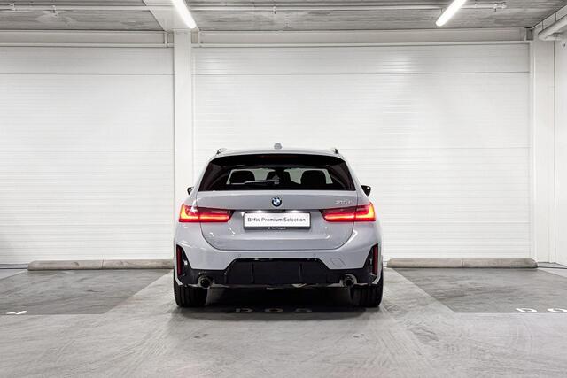 BMW 3-SERIE Touring 318i | M-Sport Pro | Comfort Pack | Driving Assistant | Hifi System | Panoramadak | Comfort Access | Trekhaak l Huisselectie