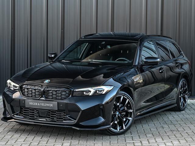 BMW 3-SERIE Touring 330e xDrive M sport | Accu 19,5kWh | Trekhaak | Panorama dak | Active Cruise | Camera | Ambiance interieur