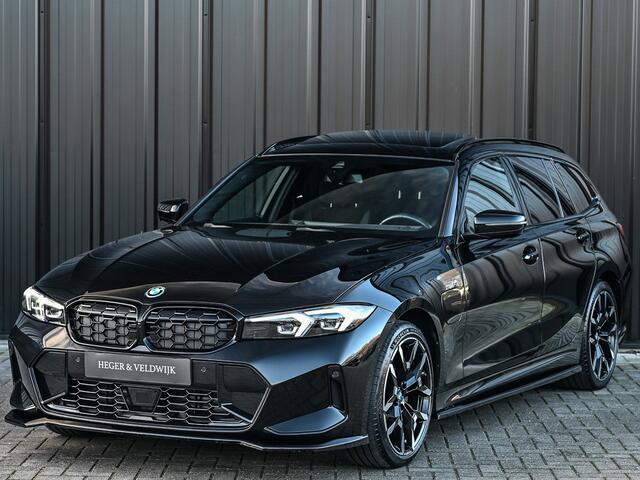 BMW 3-SERIE Touring 330e xDrive M sport | Accu 19,5kWh | Trekhaak | Panorama dak | Active Cruise | Camera | Ambiance interieur