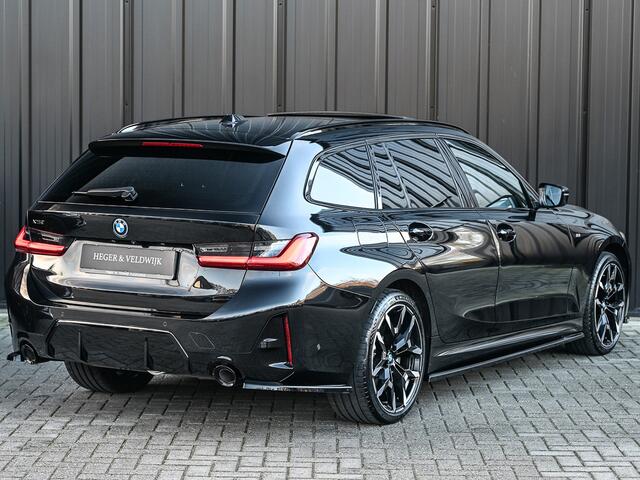 BMW 3-SERIE Touring 330e xDrive M sport | Accu 19,5kWh | Trekhaak | Panorama dak | Active Cruise | Camera | Ambiance interieur