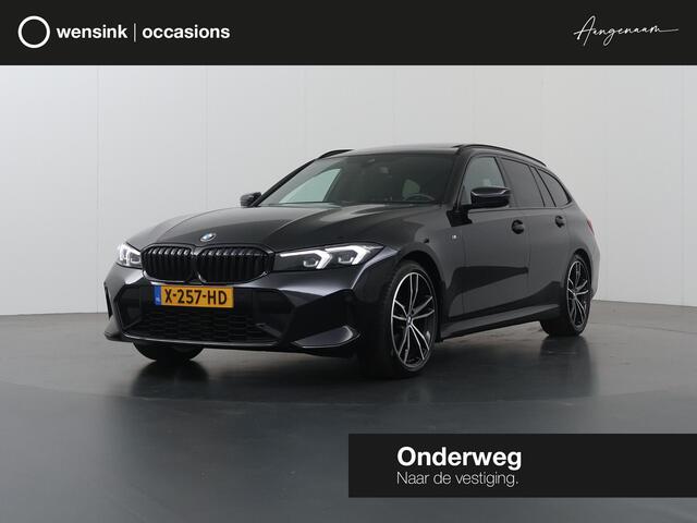 BMW 3-SERIE Touring 320i | M-Pakket | Panoramadak | Trekhaak Ele.wegklapbaar | Apple CarPlay/Android Auto | Curved Display | Stuur/Stoelverwarming | Interieur Verlichting | Sportstoelen | Camera | DAB | Ele. kofferdeksel |
