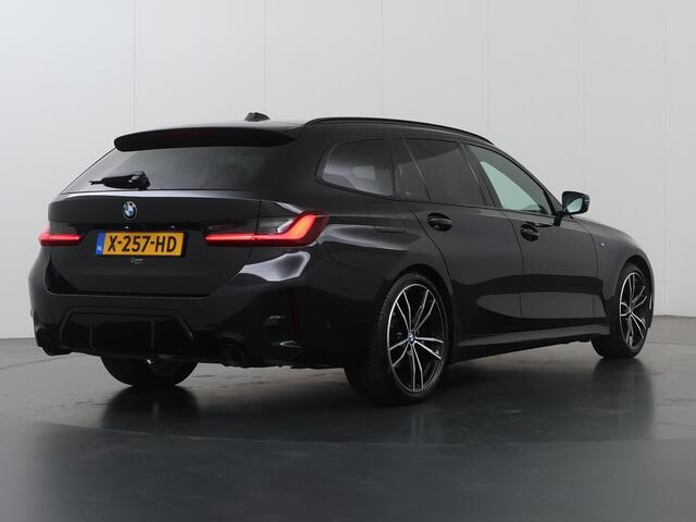 BMW 3-SERIE Touring 320i | M-Pakket | Panoramadak | Trekhaak Ele.wegklapbaar | Apple CarPlay/Android Auto | Curved Display | Stuur/Stoelverwarming | Interieur Verlichting | Sportstoelen | Camera | DAB | Ele. kofferdeksel |