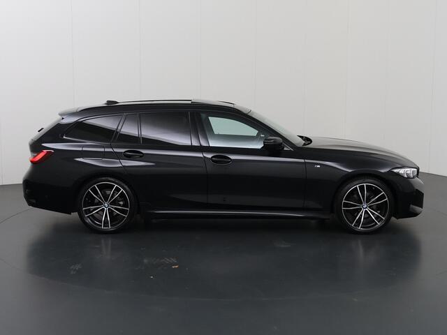 BMW 3-SERIE Touring 320i | M-Pakket | Panoramadak | Trekhaak Ele.wegklapbaar | Apple CarPlay/Android Auto | Curved Display | Stuur/Stoelverwarming | Interieur Verlichting | Sportstoelen | Camera | DAB | Ele. kofferdeksel |
