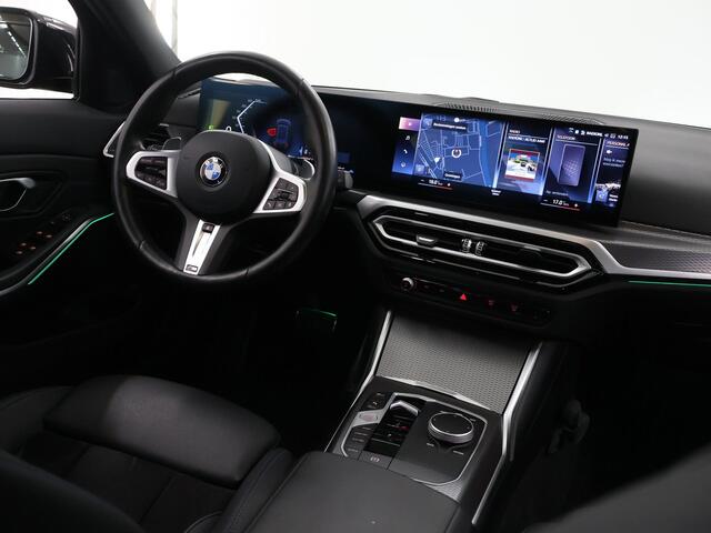 BMW 3-SERIE Touring 320i | M-Pakket | Panoramadak | Trekhaak Ele.wegklapbaar | Apple CarPlay/Android Auto | Curved Display | Stuur/Stoelverwarming | Interieur Verlichting | Sportstoelen | Camera | DAB | Ele. kofferdeksel |