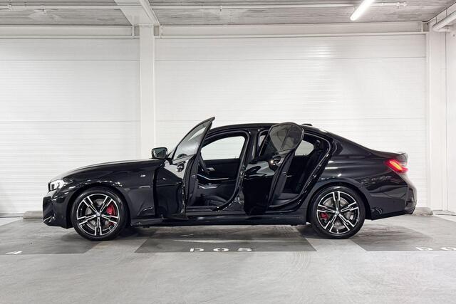BMW 3-SERIE Sedan 318i | M-Sport Pro | Comfort Pack | Trekhaak | Comfort Access | Harman/Kardon | Stoelverwarming | Huisselectie